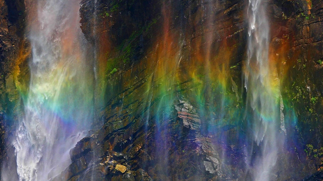 Stunning Rainbow Emerges from the Convergence of Waterfall and Light ...