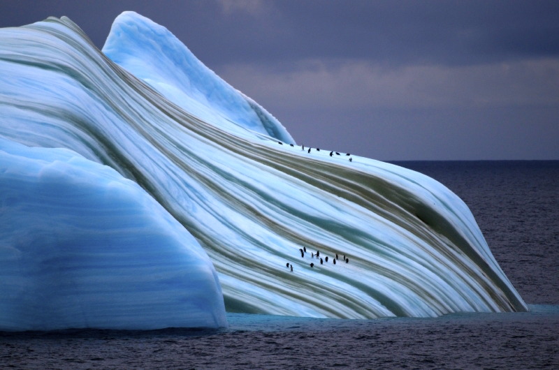 NRDC — nubbsgalore: striped icebergs form as meltwater...